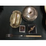 FIVE ITEMS TO INCLUDE WHITE METAL PEN REST, LIDDED TRINKET DISH, BONE HANDLED EPNS PICKLE FORK,