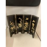 A MINIATURE FOLDING SCREEN EMBOSSED WITH MOTHER OF PEARL DECORATION DEPICTING BIRDS AND FLOWERS.