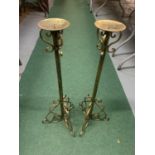 A PAIR OF TALL BRASS CANDLE HOLDERS HEIGHT 28CM