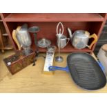 AN ASSORTMENT OF ITEMS TO INCLUDE A CAST IRON GRIDDLE PAN, PICQUOT WARE TEA AND COFFEE POTS AND A