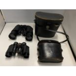 TWO PAIRS OF CASED BINOCULARS