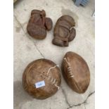 AN ASSORTMENT OF VINTAGE SPORTS EQUIPMENT TO INCLUDE A FOOTBALL AND BOXING GLOVES ETC