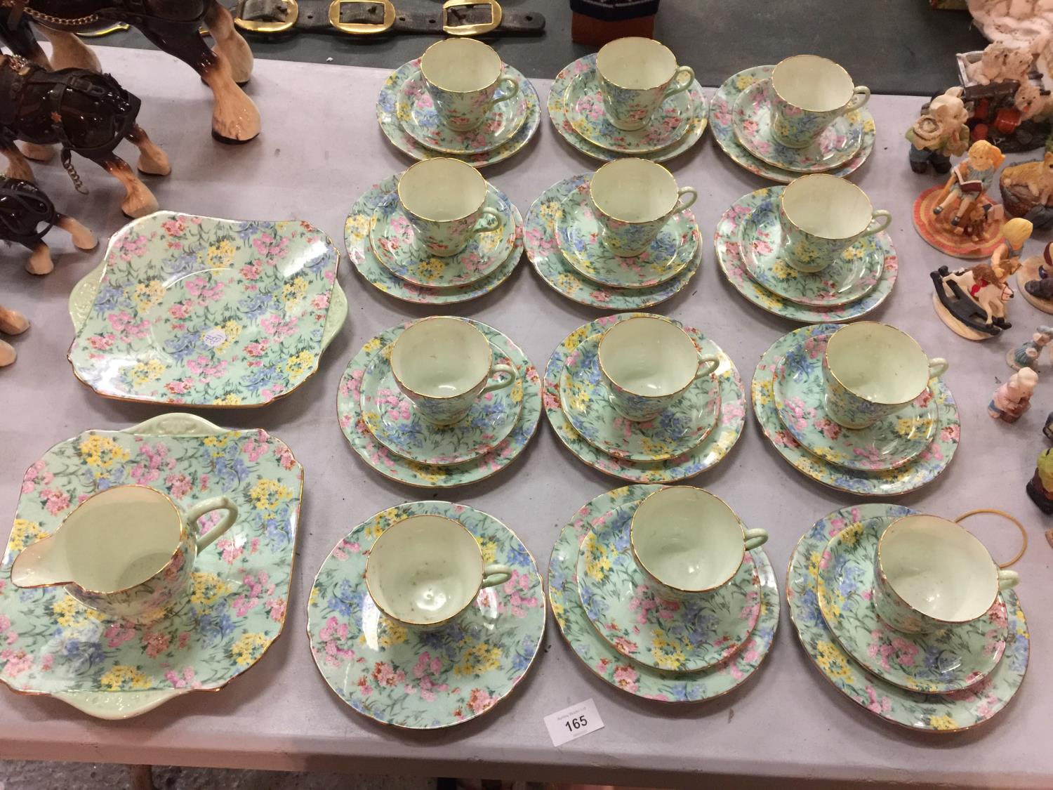 A QUANTITY OF SHELLEY 'MELODY' TEAWARE TO INCLUDE, CUPS, SAUCERS, PLATES, CREAM JUG, ETC