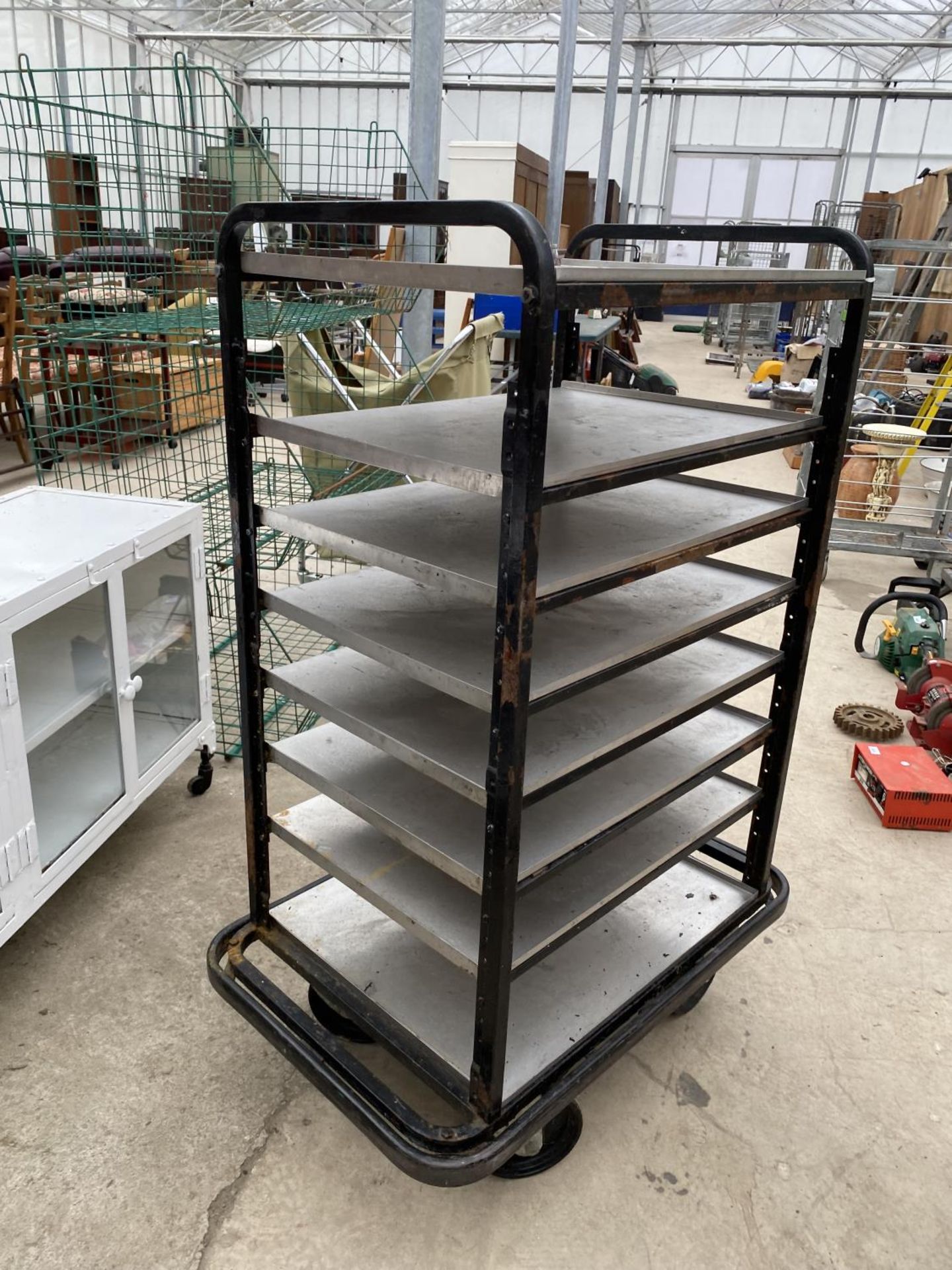 A FOUR WHEELED STAINLESS STEEL EIGHT TIERED TROLLEY - Image 4 of 5