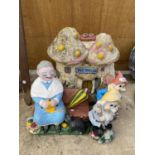 FOUR VARIOUS GARDEN ORNAMENTS TO INCLUDE A STONE 'TOAD STOOL INN' AND TWO GNOMES ETC