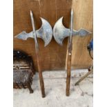 A PAIR OF METAL VIKING STYLE AXES WITH WOODEN HANDLES