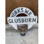 A VINTAGE CAST IRON YORKS.W.R. GLUSBURN SIGN