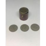 A SIXPENCE COIN HOLDER AND THREE SIXPENCES TO INCLUDE 1947, 1949 AND 1961