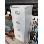 A METAL FOUR DRAWER SILVERLINE FILING CABINET