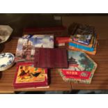 A QUANTITY OF VINTAGE GAMES AND JIGSAWS TO INCLUDE MONOPOLY, CHINESE CHECKERS, ETC