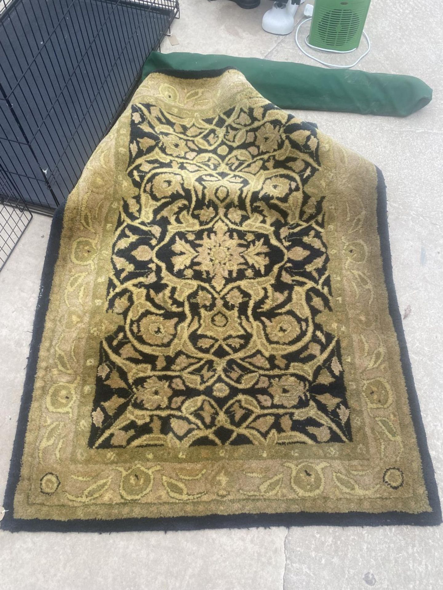 A CREAM PATTERNED RUG