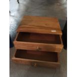 A SMALL WOODEN TWO DRAWER CHEST HEIGHT 23 CM, LENGTH 40 CM, DEPTH 30 CM