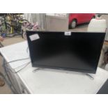 A 22" SAMSUNG TELEVISION WITH REMOTE COTROL