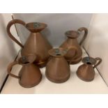 A SET OF FIVE GRADUATED COPPER JUGS MARKED 1/2 PINT TO 1 GALLON WITH SEAL MARKS