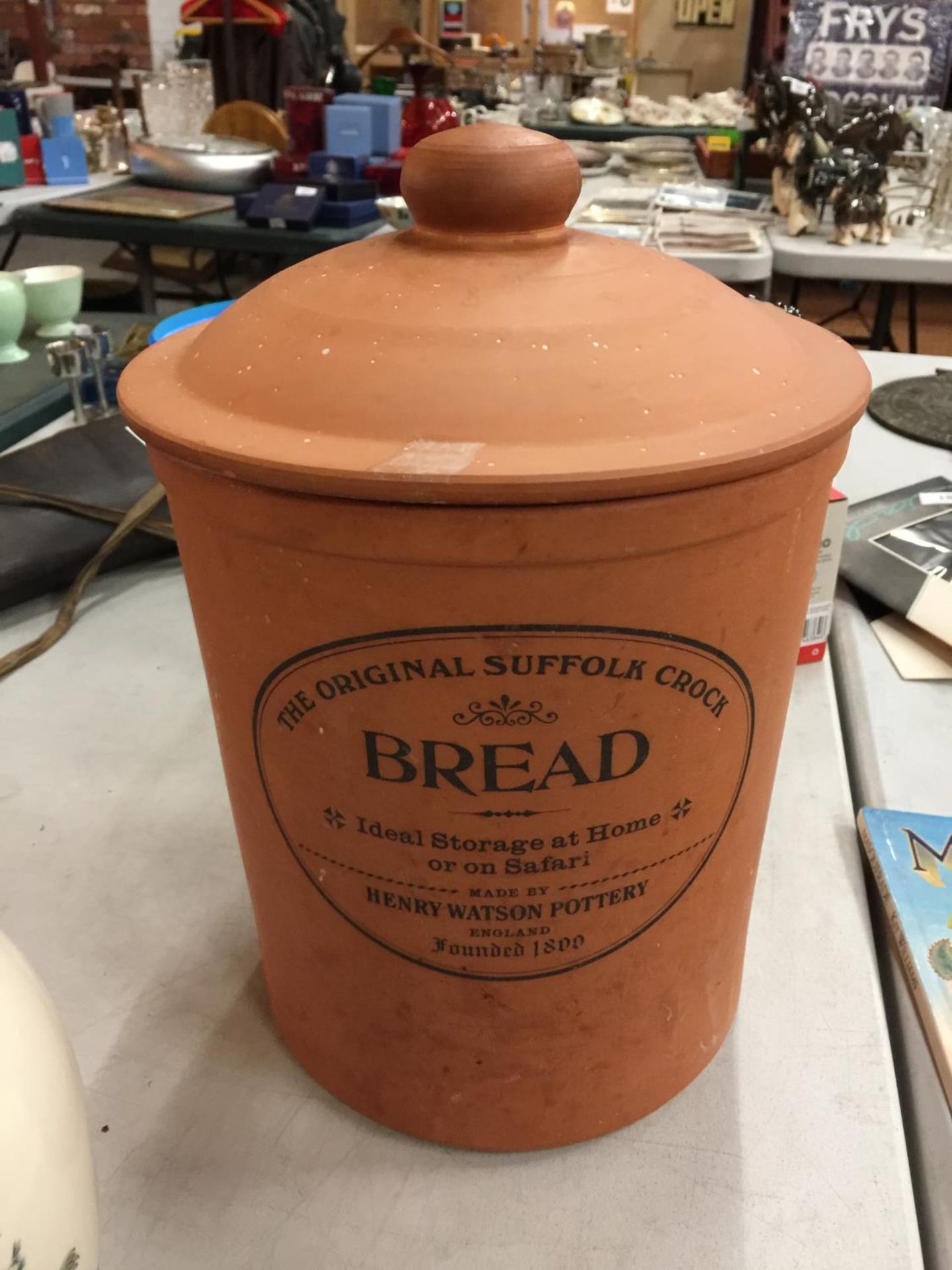 A TERRACOTTA LIDDED BREAD CROCK HEIGHT APPROX 34CM