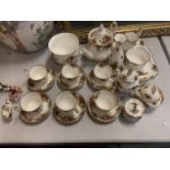 TWENTY TWO PIECES OF ROYAL ALBERT OLD COUNTRY ROSES TO INCLUDE SIX CUPS AND SAUCERS, TEAPOT, MILK