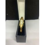 A GOLD PLATED WRIST WATCH IN WORKING ORDER BUT NO WARRANTY WITH A PRESENTATION BOX