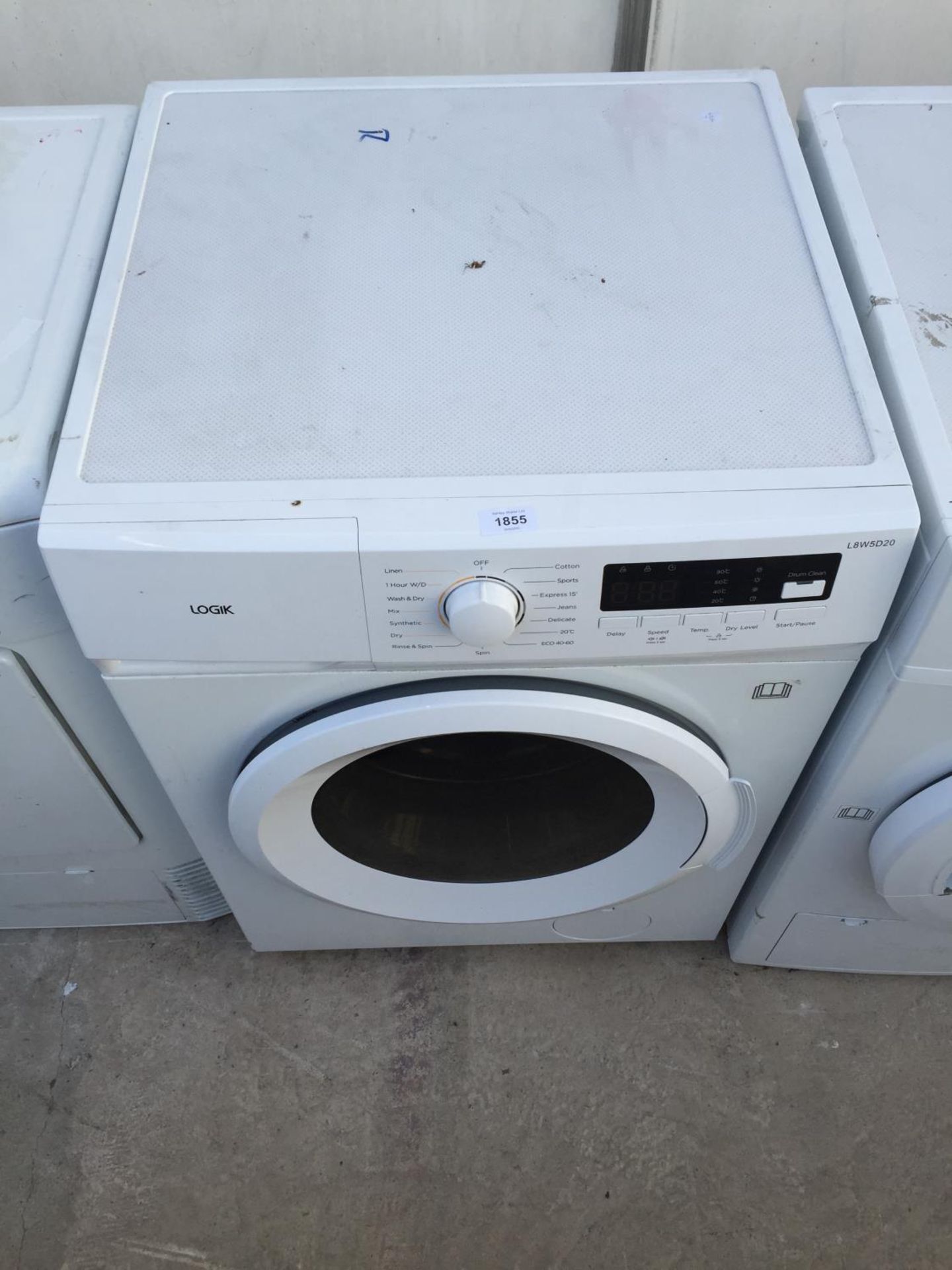 A WHITE LOGIK WASHING MACHINE