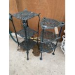 TWO CAST IRON THREE TIERED PLANT STANDS