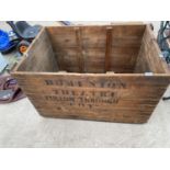 A LARGE VINTAGE WOODEN CRATE STAMPED DOMINION