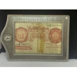 A FRAMED TEN SHILLINGS NOTE