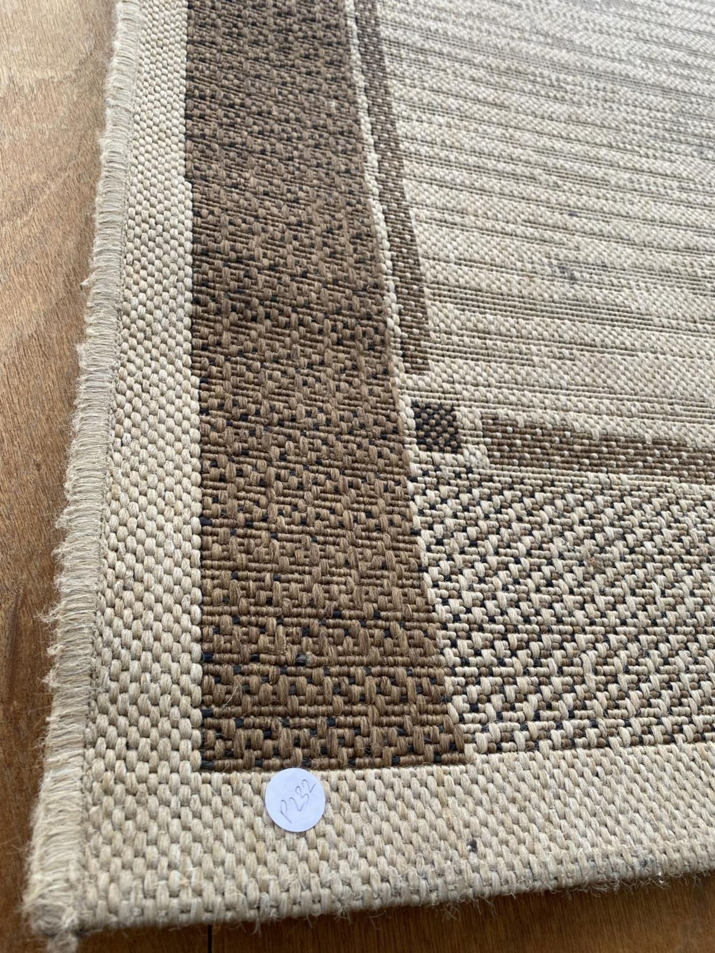 A MODERN CREAM WOVEN RUG - Image 2 of 2