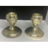 A PAIR OF HALLMARKED BIRMINGHAM SILVER CANDLESTICKS