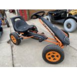 A CHILDRENS KETTLER PEDDLE GO KART