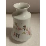 A HAND PAINTED ORIENTAL VASE SIGNED TO THE BASE