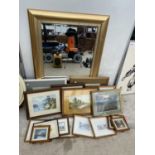 A LARGE FRAMED WALL MIRROR AND AN ASSORTMENT OF FRAMED PRINTS AND PICTURES