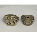 TWO HEAVY MARKED SILVER RINGS ONE DEPICTING A WESTERN SADDLE AND THE OTHER A KNOT GROSS WEIGHT 56.