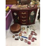 A JEWELLERY BOX WITH COSTUME JEWELLERY TOGETHER WITH VARIOUS COLLECTABLE BUS BADGES ETC.