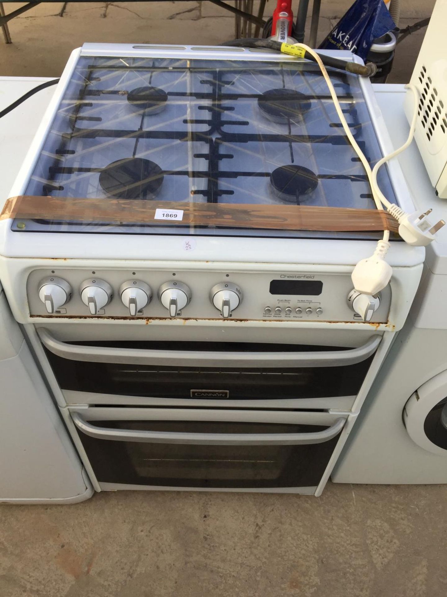 A WHITE CANNON ELECTRIC AND GAS OVEN AND HOB