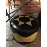 A VINTAGE LEATHER AND FABRIC ROUND POUFFE WITH METAL BUTTON FEET AND HANLEY MAKERS BADGE TO BASE