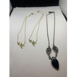 THREE MARKED SILVER NECKLACES TO INCLUDE THREE SILVER GILT WITH SWALLOWS AND A DECO STYLE PENDANT