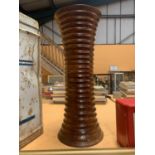 A LARGE WOODEN VASE (A/F) HEIGHT 50CM