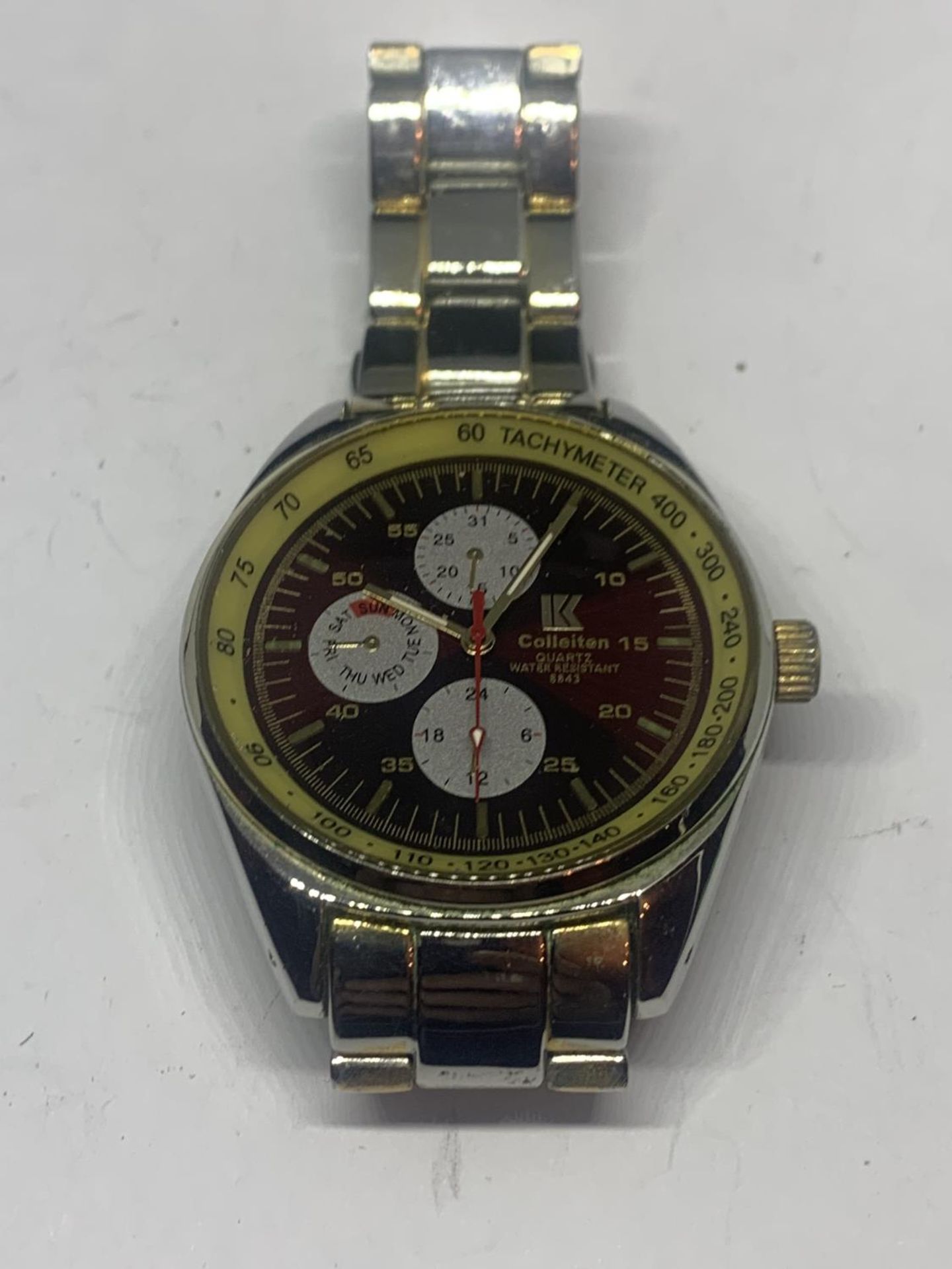 A COLLEITEN WRIST WATCH SEEN WORKING BUT NO WARRANTY