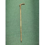 A CARVED HANDLED BAMBOO WALKING STICK