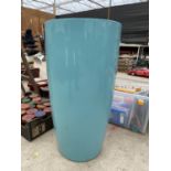 A TALL STYLISH INDIVIDUAL MODERN FIBRE GLASS PLANTER