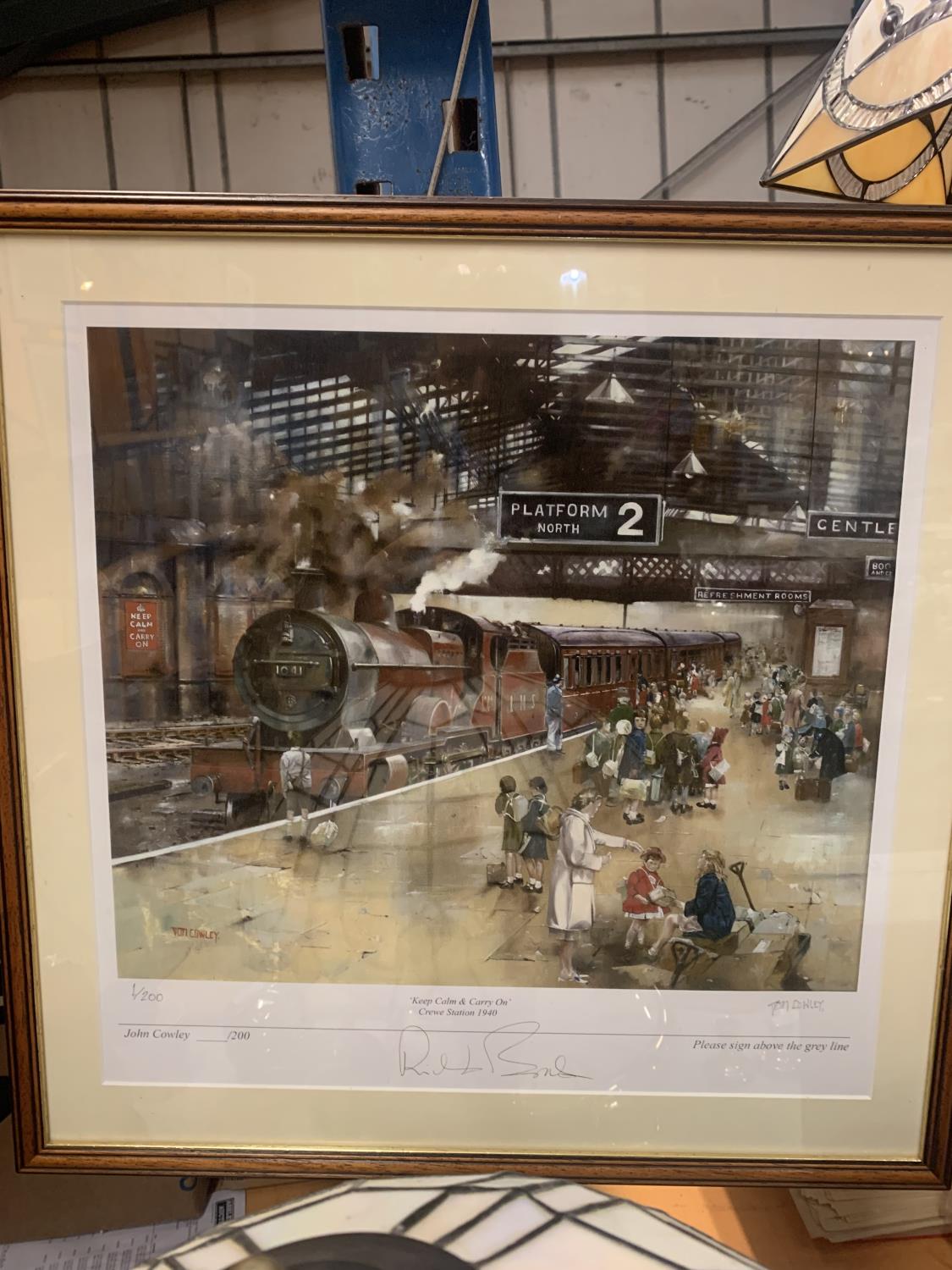 A FRAMED LIMITED EDITION PRINT 1/200 KEEP CALM AND CARRY ON CREWE STATION 1940 BY JOHN COWLEY SIGNED