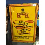 AN ENAMEL KODAK 'LOTS TO PHOTOGRAPH ON THIS RIDE' SIGN