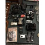 A LARGE COLLECTION OF CAMERAS TO INCLUDE PRAKTICA, OLYMPUS, CANON ETC. AND FURTHER FLASH AND LENS