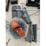AN ASSORTMENT OF ITEMS TO INCLUDE PLANTERS, HANGING BASKETS AND A GARDEN SEEDER ETC