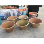 A LARGE COLLECTION OF TERRACOTTA PLANT POTS