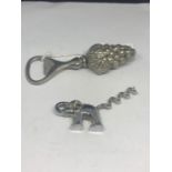 TWO SILVER PLATED ITEMS TO INCLUDE AN ELEPHANT CORKSCREW AND A BUNCH OF GRAPES BOTTLE OPENER