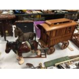A SHIRE HORSE WITH HARNESS, WOODEN ROMANY CARAVAN AND WOODEN HORSE