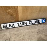 AN ENAMEL 'BLEA TARN CLOSE' ROAD SIGN