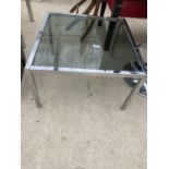 A CHROMIUM PLATED COFFEE TABLE WITH SMOKED GLASS TOP, 24" SQUARE