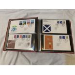 A RED FIRST DAY COVER ALBUM COVERING 1980 - 1988