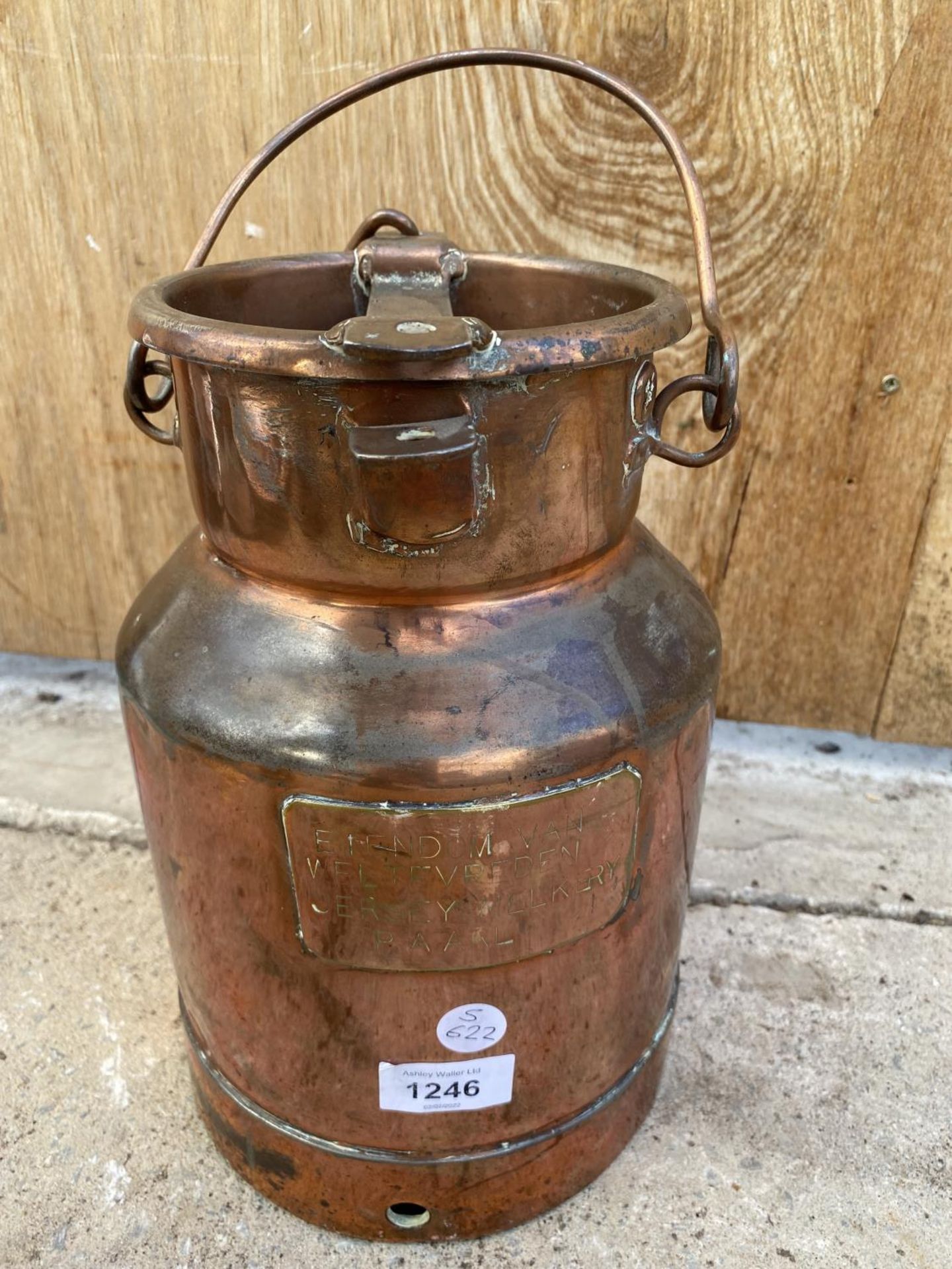 A SMALL VINTAGE COPPER MILK CHURN STAMPED 'JERSEY MELKERY'